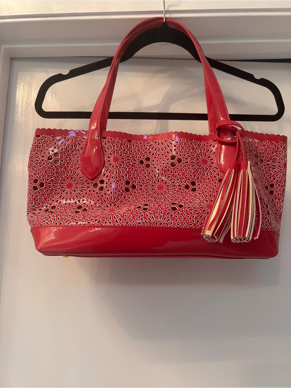 Red Laser-Cut Tote with Tassel Accent